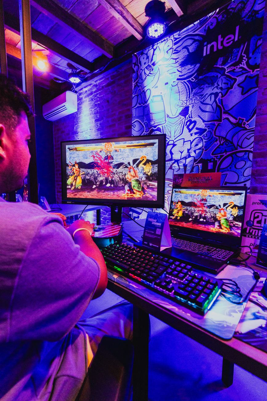 man playing pc game in tournament