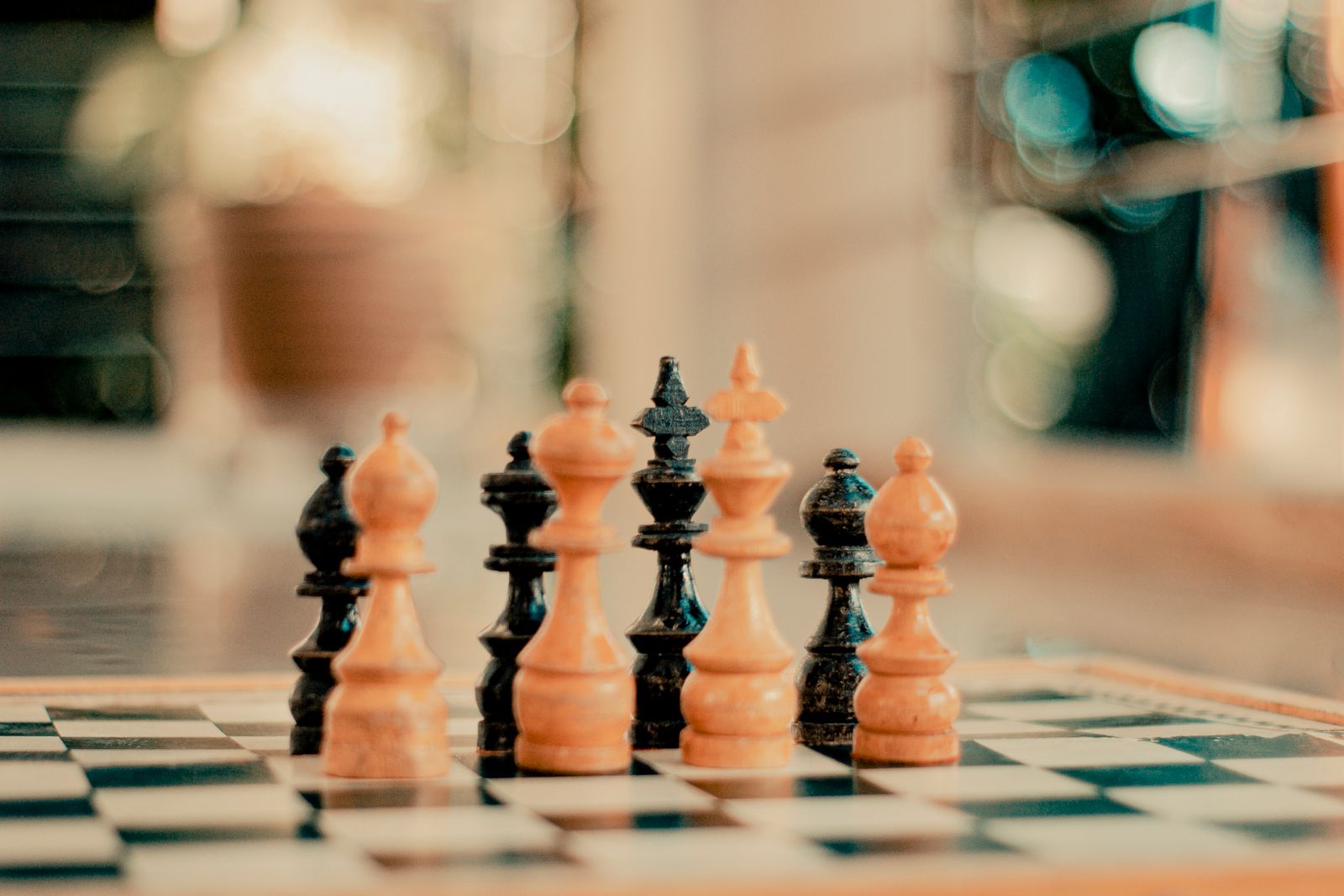 Chess pieces on a board — US vs Chinese AI capability tracker
